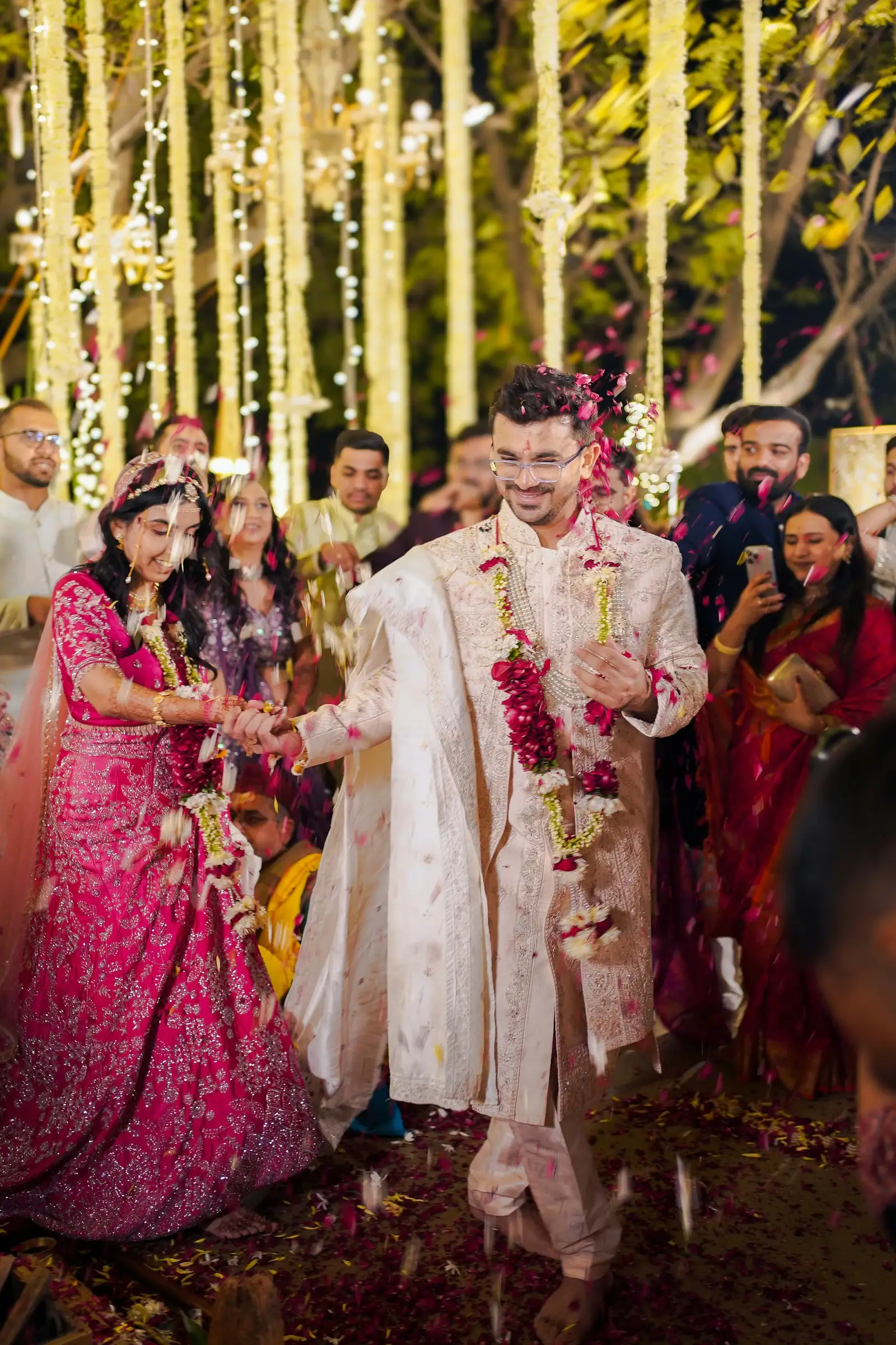 The couple walking together after their ceremony